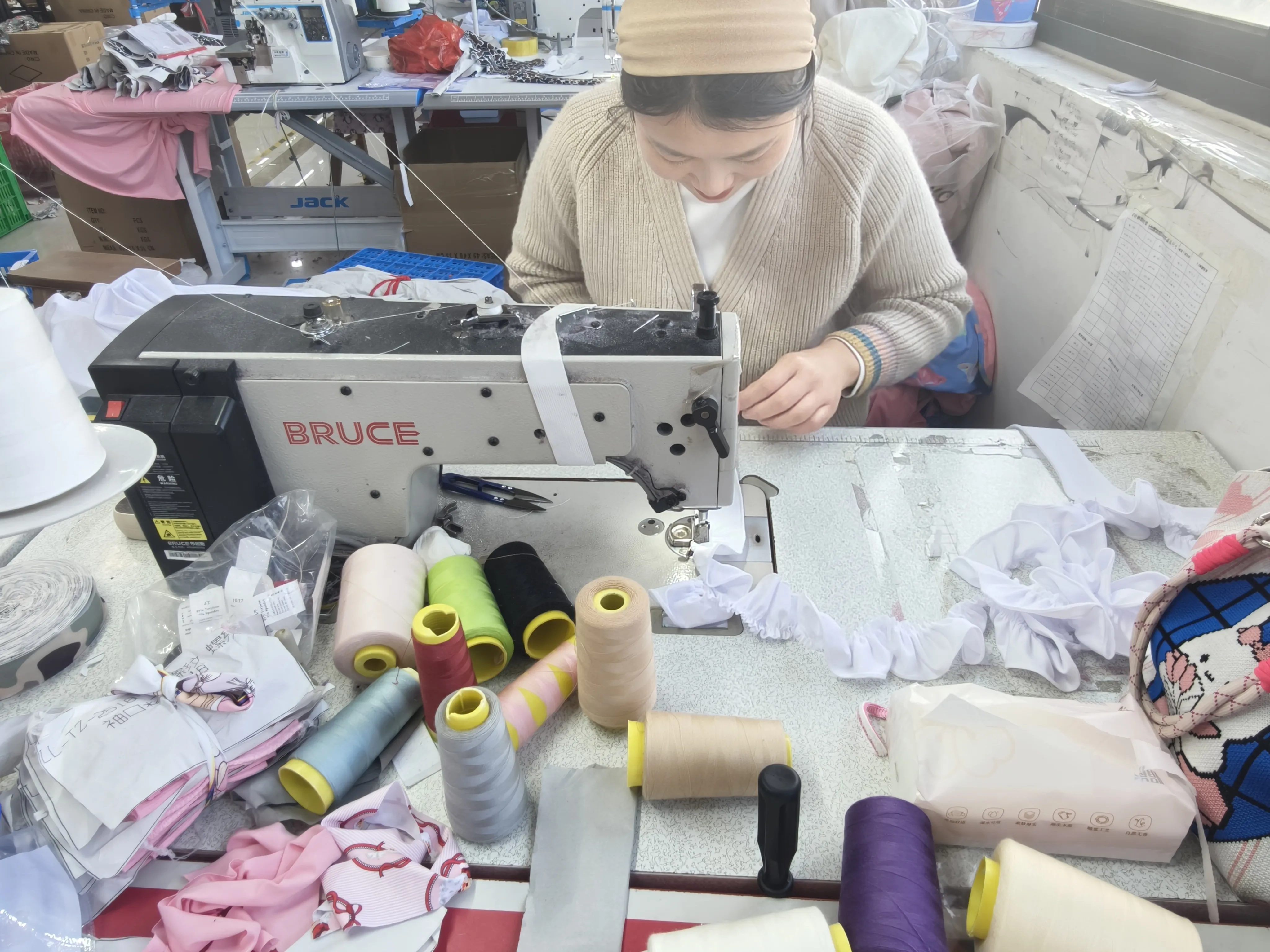 Factory team checking finished children’s garments